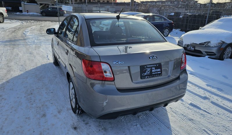 
								2010 Kia Rio full									