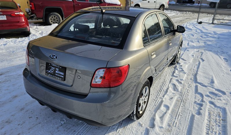 
								2010 Kia Rio full									